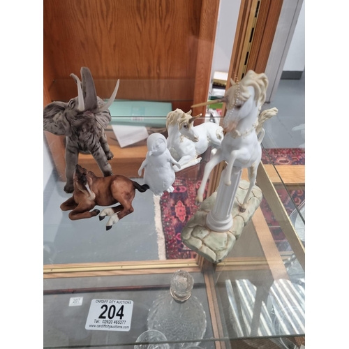 204 - 5 Kaiser Porcelain figures - two unicorns - one horn repaired and the tip of the other horn missing,... 