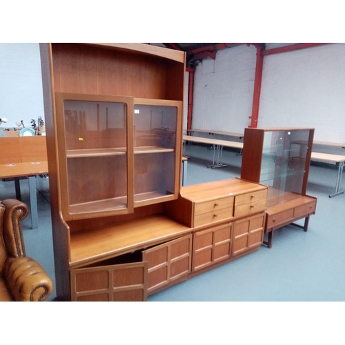 113 - A teak Nathan display cabinet, Nathan sideboard and one other teak display cabinet