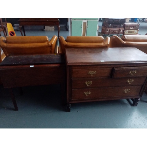 127 - An oak two over two chest of drawers and a drop leaf table