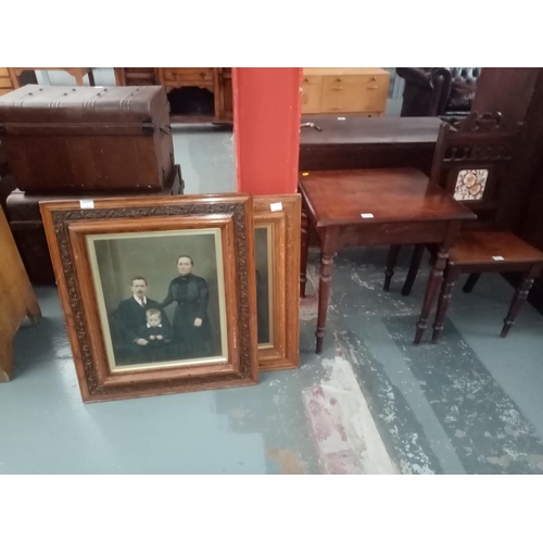 132 - A mahogany hall chair, side table and two framed paintings