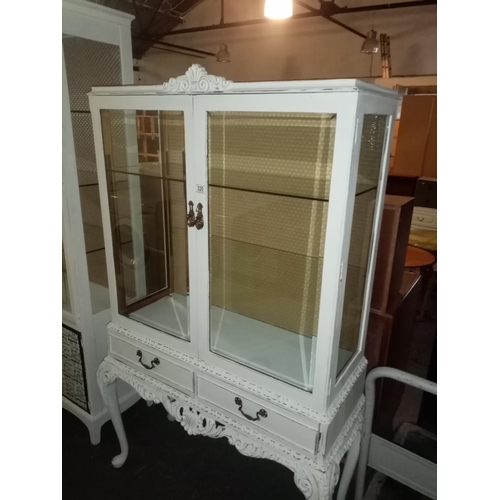 320 - A white painted display cabinet