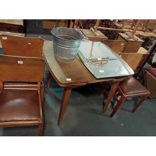 337 - A pine draw leaf dining table and 4 chairs