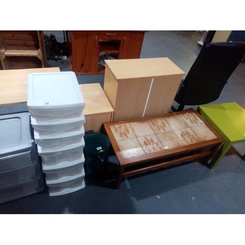 369 - 2 Plastic storage units, tile top coffee table, green side table etc