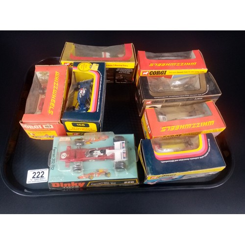 222 - Eight boxed vintage Corgi and Dinky racing cars