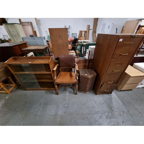 451 - Metal filing cabinet, glass fronted bookcase, oak chair, etc