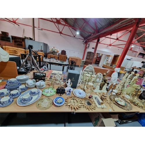 48 - A selection of buddha statues, Royal Worcester celestial figurine, wall sconces and a dressing table... 