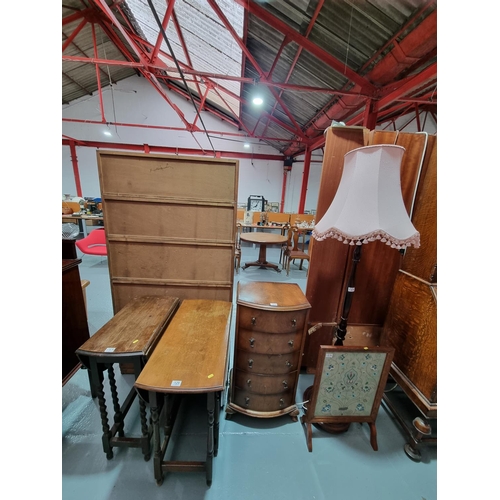 129 - Two small drop leaf side tables, chest of drawers, standard lamp and a fire screen