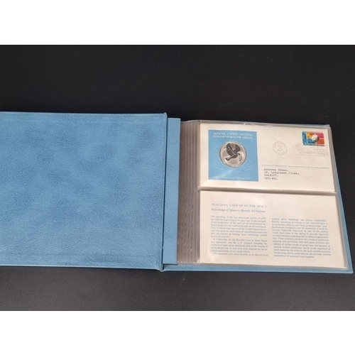 225 - Five 1975 sterling silver official United Nations Medallic First Day Covers in official album