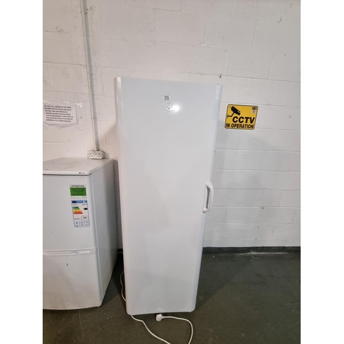 375 - An Indesit tall freezer