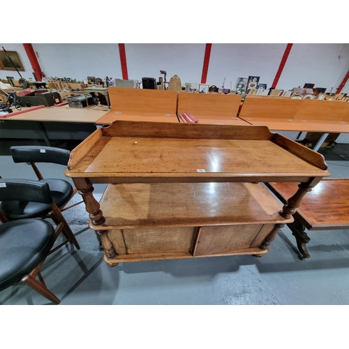 102 - A mahogany two tier buffet server sideboard