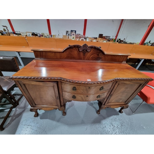 104 - An Edwardian mahogany sideboard