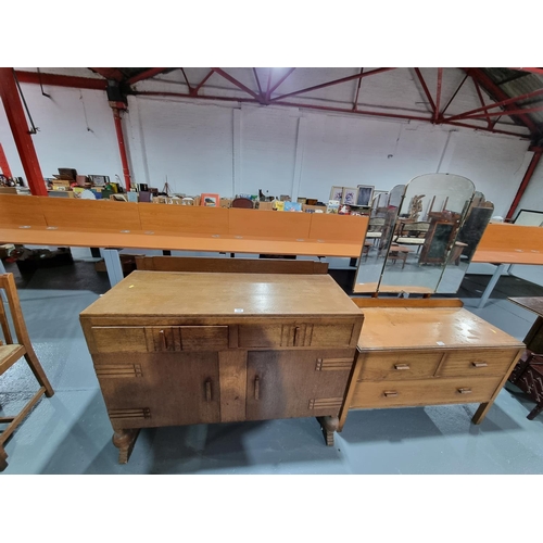 108 - An oak sideboard and a triple mirror dressing table