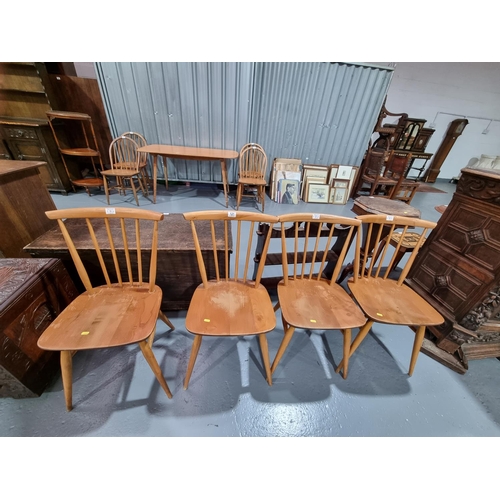 121 - Four Ercol dining chairs