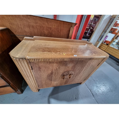 126 - An oak Art Deco sideboard