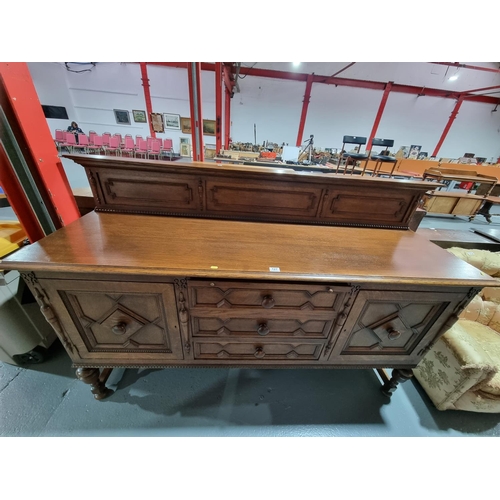 127 - An oak sideboard