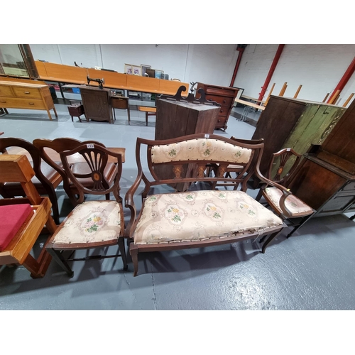 137 - A mahogany Edwardian parlour suite consisting of a two seater and two chairs