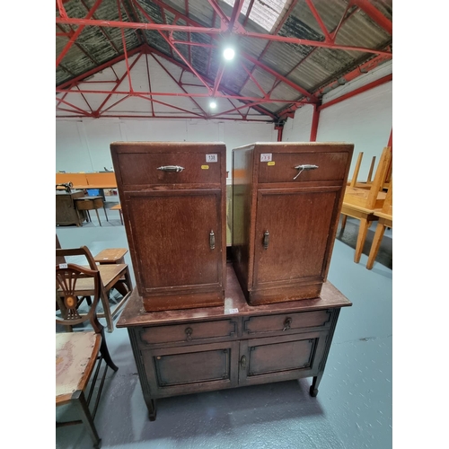 138 - A pair of oak bedside cabinets and an oak cabinet