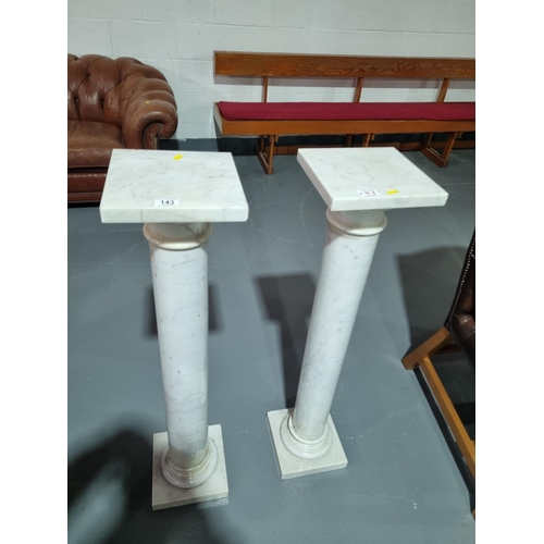 143 - Two marble plant stands