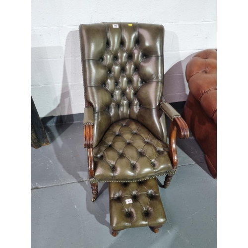 149 - A green leather Chesterfield armchair with matching stool