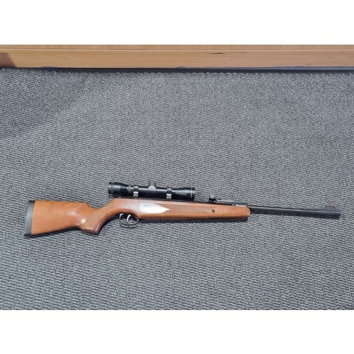 236 - A Remington .177 air rifle with telescopic sight, pellets, etc - 