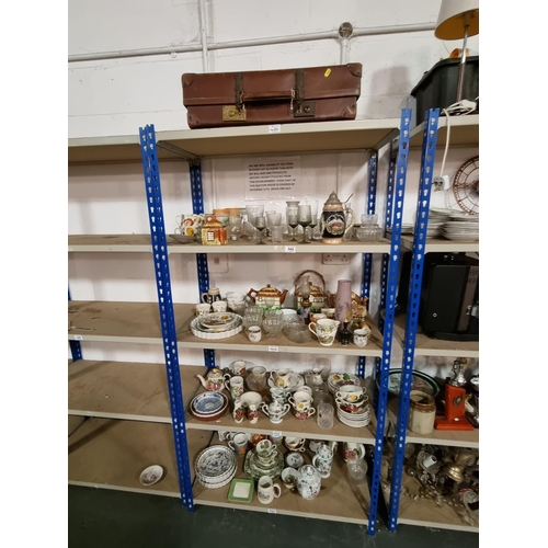 444 - 5 shelves of household items to include Revelation leather suitcase, china and glass