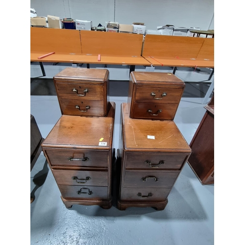 114 - A pair of mahogany bedside cabinets