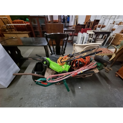 439 - Garden items to include wheelbarrow, electric lawnmower, strimmer etc