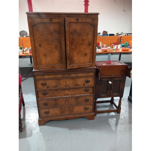 104 - A walnut bureau set on a chest of drawers and a pot cupboard