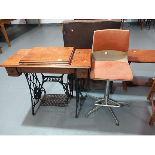 113 - A Singer sewing machine table and stool