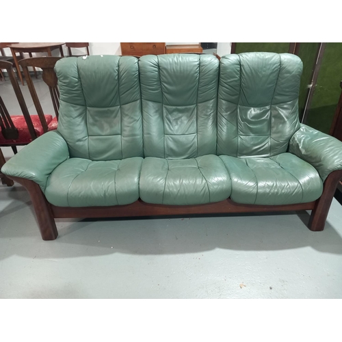 115 - A green leather 3 seater sofa