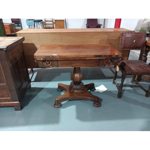 117 - A Victorian Rosewood fold over top card table