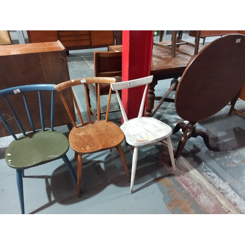 137 - Three various Ercol chairs and a mahogany tilt top table on tripod base