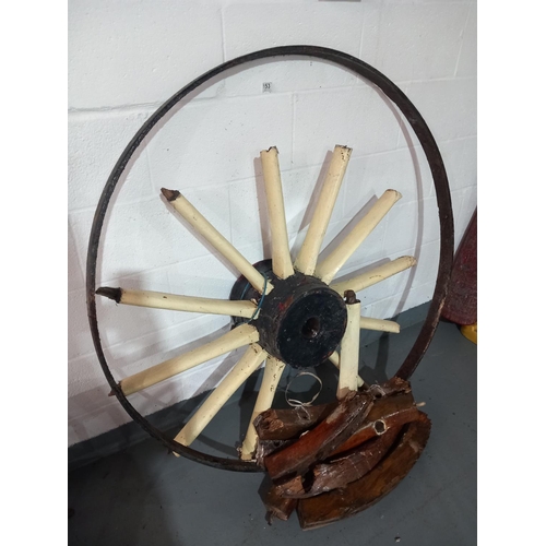 153 - A large wagon wheel for restoration