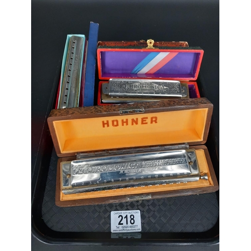 218 - Three boxed vintage harmonicas - a Hohner Chromatic Octaves professional model, a Hohner Super Chrom... 