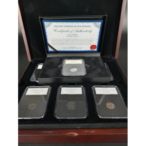 220 - An Ancient Roman silver Denari in presentation case and a set of twelve Ancient Roman coins in prese... 