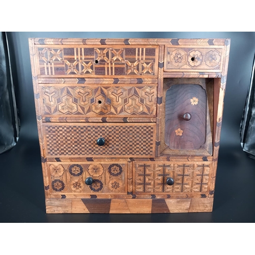 229 - A Japanese marquetry multi drawer jewellery cabinet