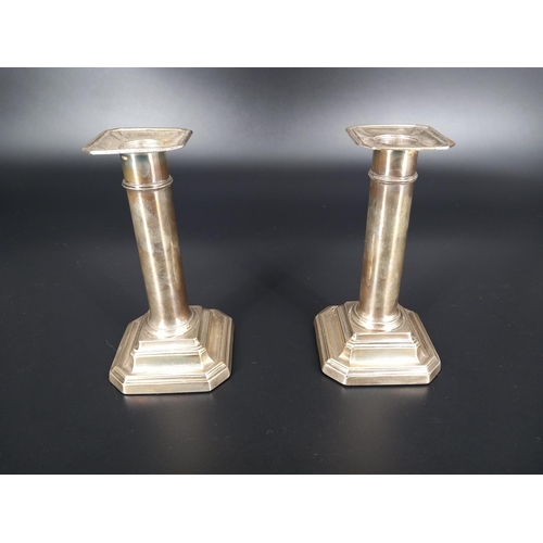 231 - A pair of silver candlesticks - hallmarks for James Dixon and Sons - Sheffield - 1905 - weighted bas... 