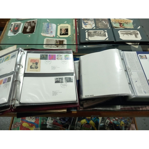 238 - A collection of first day covers, albums and stamp books