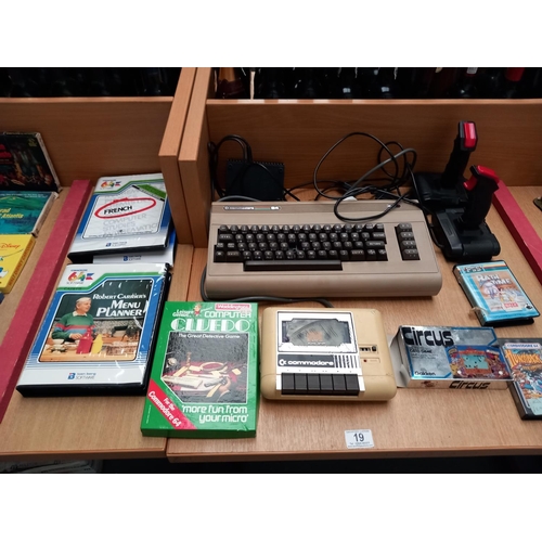 19 - A Commodore 64 console with controllers, games and a Commodore datassette