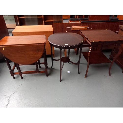 113 - An oak hall table, circular mahogany lamp table and a small drop leaf table