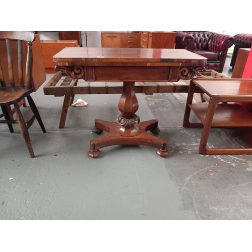 116 - A Victorian Rosewood fold over top card table