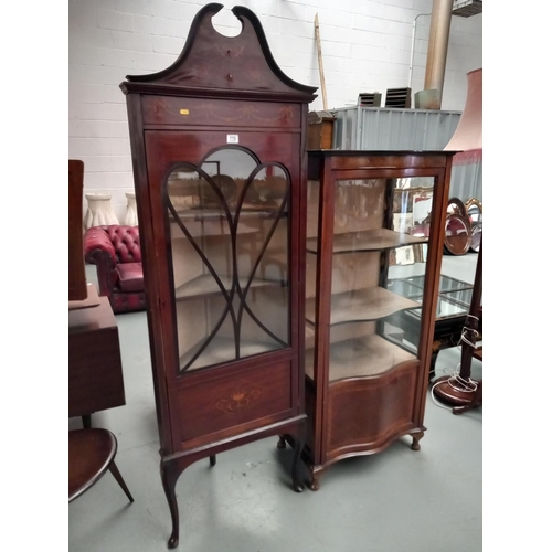 119 - A mahogany inlaid glass fronted corner cabinet and one other mahogany inlaid glass fronted cabinet