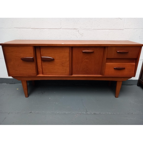 142 - A mid century teak sideboard