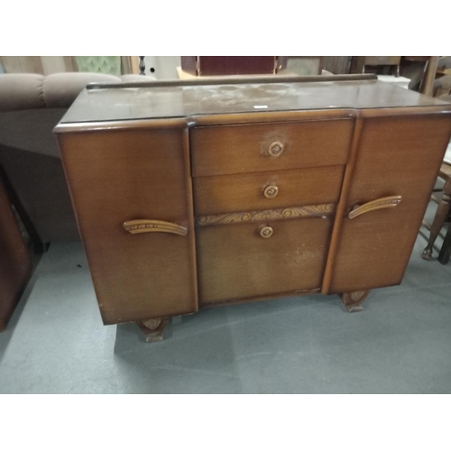 312 - An oak sideboard