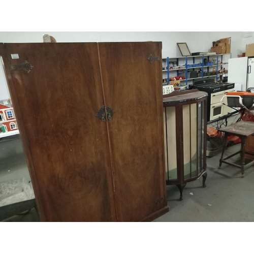 322 - An oak double wardrobe and mahogany display cabinet