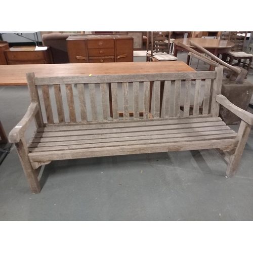 338 - A wooden garden bench