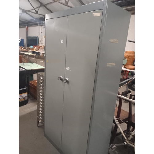 369 - A metal 2 door cabinet and a metal 15 drawer filing unit