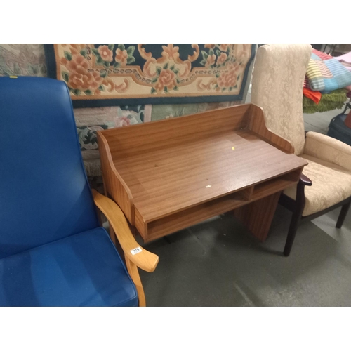 370 - An oak effect desk, fabric rocking chair, etc