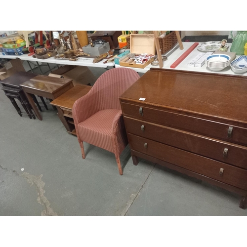 391 - An oak chest of drawers, mahogany nest of tables, Lloyd Loom style chair, etc