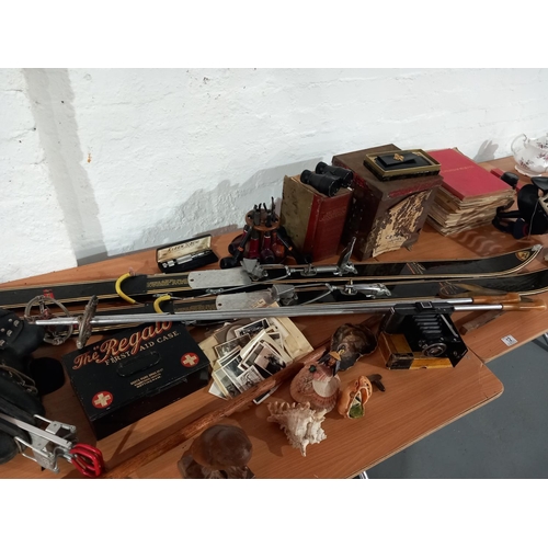 12 - A vintage lot including snow skis, boots and poles, cameras, smoking pipes, shellwork etc